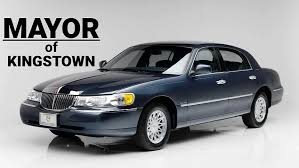 Image result for Medium Gold 1998 Town Car