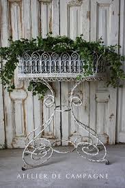 Metal Standing Jardiniere Mine Is Nearly Identical To This In Bare Metal I Practically Stole It On Craigslist For Garden Art Garden Room Garden Containers