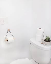 The subject of whether the toilet paper should go over or under the roll has been a debate since time immemorial. Diy Toilet Paper Holders Cheap And Easy Ideas Apartment Therapy