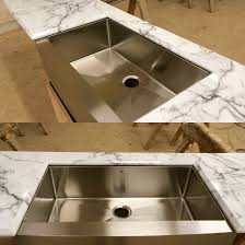 Beautiful Calcutta Marble High Gloss Laminate Countertop With A Vigo Stainless Steel Farm Sink Cu Laminate Countertops Countertops Formica Kitchen Countertops