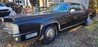Image result for Black 1969 Cadillac