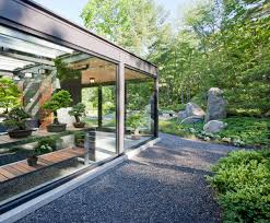 10 Gorgeous Greenhouses To Get You Excited For Spring Modern Greenhouses Modern Garden Glass Garden