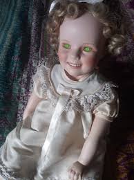 Thrift store find: old painted clay doll with blue eyes