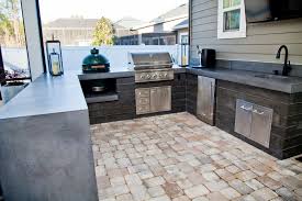 Corner outdoor kitchen with island seating the modern elongated teardrop light fixtures to either side of the outdoor kitchen are great for. Timber Texture All Concrete Outdoor Kitchen Modern Patio Jacksonville By Concrete Commander Houzz