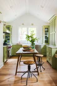 So, how much does a new kitchen cost? When There S Plenty Of Cabinet Space Set A Higher Than Average Table At Least 36 Inches In The Kitchen Cabinet Colors Green Kitchen Cabinets Country Kitchen