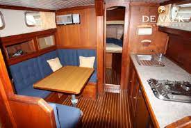 Interior finishing with solid oiled teak wood and the bulkheads are painted with classic beige color. Fisher 37 Sailing Yacht For Sale De Valk Yacht Broker