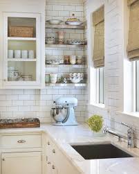 White kitchen with stainless steel floating shelves. Classic Kitchen With White Glass Front Kitchen Cabinets With Marble Countertops With Images Cottage Kitchen Inspiration Kitchen Inspirations Kitchen Renovation