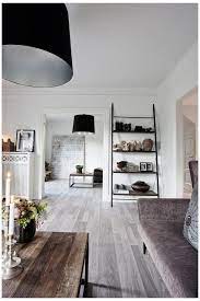 Black And White Decorating In Eclectic Style With Industrial Accents And Modernis Living Room Wood Floor Grey Wood Floors Living Room Grey Flooring Living Room