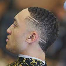 Temp Fade Haircut Waves With Carved Designs Men S Hairstyles Temp Fade Haircut Fade Haircut Mens Haircuts Fade