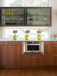 Add Wood For Warmth A Pretty And Prominent Wood Graining In These Walnut Cabinets Gi Clean Kitchen Cabinets Modern Kitchen Cabinet Design Contemporary Kitchen