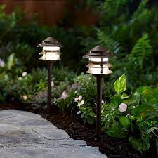 25 Landscape Path Lighting Ideas In 2021 Pathway Light Better Homes And Gardens Outdoor Garden Lighting