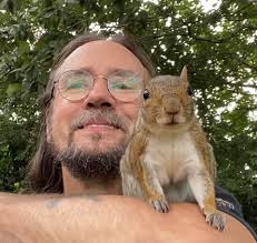 Until today our squirrel was just a visitor and a little aloof. I don't  know what's changed but she decided to take an almond directly from me this  morning and now ...