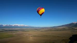 Hot Air Balloon Flying Across Stock Footage Video 100 Royalty Free 1486819 Shutterstock
