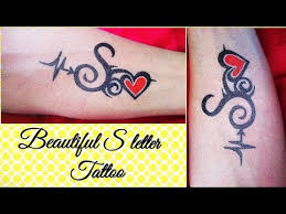 :).tattoo love is a very classy and clean. Simple And Beautiful S Letter Tattoo With Heart Youtube