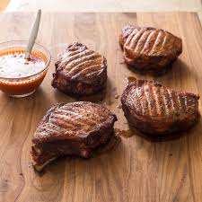 Pork chops are dipped into a asian inspired sauce with pineapple juice, soy sauce, ginger and garlic, and then coat. Texas Thick Cut Smoked Pork Chops Cook S Country