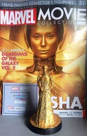 During the latter half of the film, both michael rooker's yondu and sean as the scene pans out, ayesha introduces a giant gold sarcophagus (the sovereign just love gold), while ayesha explains to a terrified minion. Marvel Movie Collection 51 Ayesha Figurine Golden High Priestess Figurine Guardian Kaufen Bei Hood De