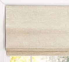 Touchlift cordless shade lifts gently and automatically with a slight pull on the hem. Emery Linen Cordless Roman Blackout Shade Pottery Barn