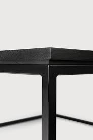 You can think of the coffee table as a piece of larger puzzle that is the décor of your living room. Oak Thin Black Coffee Table