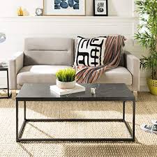 99 $6.00 coupon applied at checkout save $6.00 with coupon Safavieh Home Baize Black Rectangle Coffee Table Buy Online In Angola At Angola Desertcart Com Productid 149323958