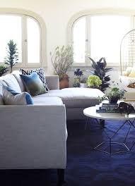Decorative accents most notably, brass, marble, and natural wood tones. L A Bungalow Makeover West Elm Living Room Bungalow Living Rooms Living Room Carpet
