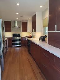 Mid Century Modern Sapele Cabinets With White Face Frames Cabinets By Danny Woods Custom Cabinets Dannywoodsc Kitchen Remodel Home Kitchens Kitchen Cabinets