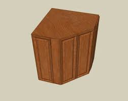 A corner cabinet is a great way to take advantage of a space that's often wasted in a room. Lower Corner Cabinet Free Woodworking Plan Com