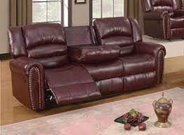 Maybe you would like to learn more about one of these? 686 Burgundy Leather Reclining Sofa With Console And Nailhead Trim
