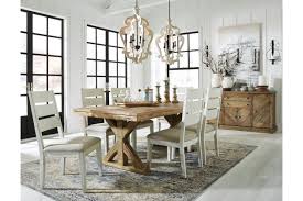 Base allows for seating around the entire table without being in the way of chairs and legroom. Grindleburg Dining Table Ashley Furniture Homestore