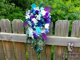 White, cream, silver, and green combine well with both purple and blue, while view image. Dress My Wedding Teal And Purple Cascading Bouquet