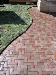 A team of installers demonstrate the steps in laying azek vast pavers in a backyard patio. Pin On Outdoor Gardening