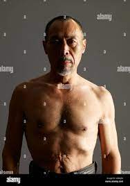 Close up of mature man shirtless Stock Photo - Alamy