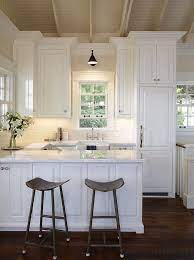 It is light and airy with little wooden details here and there. In Praise Of The Small Kitchen Loft Cottage Small Cottage Kitchen Small White Kitchens Kitchen Design Small