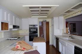 Adding crown moulding inside the soffit is a great way to give it a. How To Replace Fluorescent Light Fixture In Kitchen