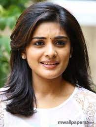 All of these ladies are glamorous and talented. Nivetha Thomas Hd Image Wallpapers Hd Images Image Beautiful Indian Actress