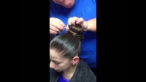 Your hair do might go perfectly with your leotard in the pictures, but it's pretty useless when it unravels seconds into the actual competition. Hair How To Make A Gymnastics Bun Youtube
