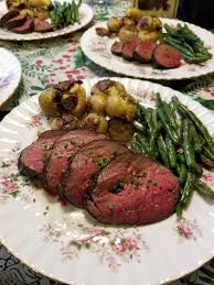 Hard to believe it's so easy to prepare! Christmas Dinner Reverse Seared Beef Tenderloin Crispy Creamy Inside Out Garlic Potatoes And Sauteed Green Beans Seriouseats