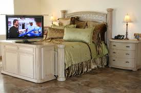 These bed frames come with a separate stand for the headboards. Tv Lift Foot Of Bed Houzz