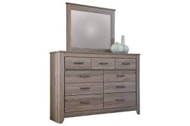 The king or queen size bed includes headboard, footboard, and rails. Zelen Queen Panel Bed With Dresser Mirror And Nightstand Ashley Furniture Homestore