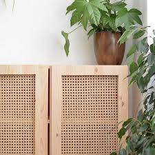 The middle counter space is perfect for bottles or more wine glasses. Diy Cane Cabinet Ikea Hack Burkatron