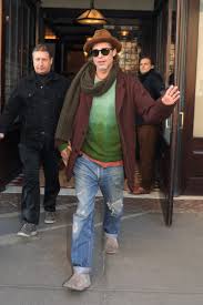 The actor touched down in paris on tuesday morning looking mighty fine in a pair of ripped jeans with a white thermal shirt and a dark jacket. Brad Pitt S Style Has Moved On From 90s Statement Looks British Vogue