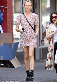 Kruger and reedus' cat, named eye in the dark, lounges near their staircase. Diane Kruger Slips Her Slender Figure Into A Summery Pink Floral Dress As She Has Coffee For Two Uk Time News