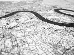 The puzzle on it contains black/white dot squares and several hexagonal dots on the path. Create You Personalise City Map Jigsaw Puzzle