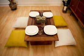 Japanese Style Low Dining Table With Colored Seating Pillows Japanese Dining Table Low Dining Table Traditional Dining Tables They are usually short heighted the main reason why the japanese sit on the floor is a tradition and that tradition is more specifically high top seats are generally different than seats used on tables. japanese style low dining table with