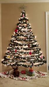 21 Classic Christmas Wall Trees To Copy Right Now Wall Christmas Tree Easy Christmas Decorations Christmas Tree Decorations Diy