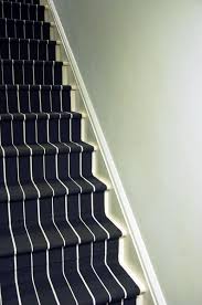 I Ve Mentioned Before That One Of The First Things We Did After Moving In Was Pull Out The Horrible Red Commercial Grade Carpeti Diy Stairs Stair Runner Stairs