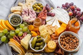 Add meats and cheese, placing larger items like sliced meats and blocks or slices of cheese on the board first. How To Make A Charcuterie Board Cheese Board Valentina S Corner