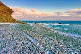 Perfect for a rainy day! Glass Beach In Russia Turns Empty Beer Bottles Into Colourful Pebbles