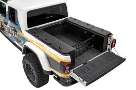 This is our 2020 jeep gladiator mojave ozark mountain edition, finished in stunning gobi clear coat, complimented by a custom quilted black leather w/ orange stitching interior! Updated Tuffy Security Products Unveils Jeep Gladiator In Bed Storage System Moparinsiders