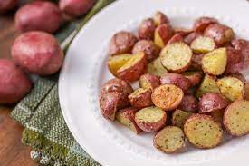 Cut your potatoes in half, then toss them in a mixture of olive oil, dried herbs, garlic, parmesan cheese and seasonings. Oven Roasted Red Potatoes Recipe 4 Ingredients Video Lil Luna