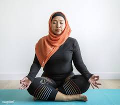 Download Premium Image Of Islamic Woman Doing Yoga In The Room 399934 How To Do Yoga Woman Yoga Women